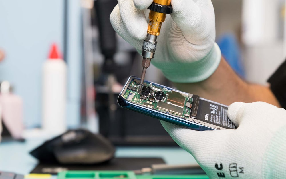 Handy am reparieren