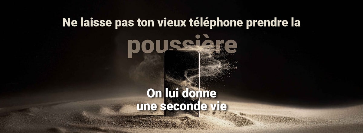 Téléphone mobile dans un paysage de sable, entouré de sable